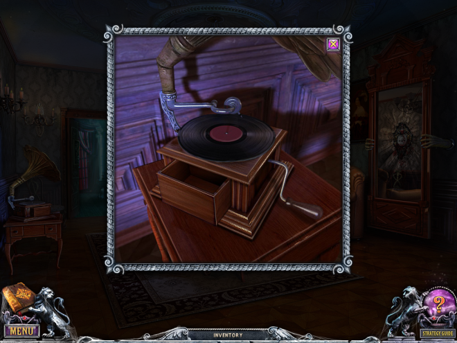 An old record player on a table.